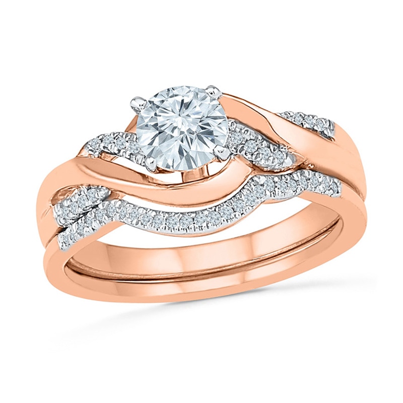 Main Image 1 of Lab-Created White Sapphire and 1/10 CT. T.W. Diamond Twist Bridal Set in 10K Rose Gold