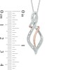 Thumbnail Image 2 of Diamond Accent Swirl Ribbon Pendulum Pendant in Sterling Silver and 10K Rose Gold