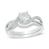 Thumbnail Image 0 of 5.5mm Lab-Created White Sapphire and 1/10 CT. T.W. Diamond Swirl Frame Bridal Set in Sterling Silver
