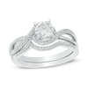 Thumbnail Image 1 of 5.5mm Lab-Created White Sapphire and 1/10 CT. T.W. Diamond Swirl Frame Bridal Set in Sterling Silver