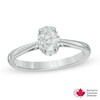 Thumbnail Image 0 of 5/8 CT. T.W. Certified Canadian Oval Diamond Frame Engagement Ring in 14K Gold (I/I2)