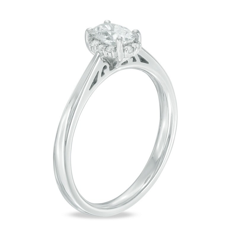 5/8 CT. T.W. Certified Canadian Oval Diamond Frame Engagement Ring in 14K Gold (I/I2)