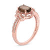 Thumbnail Image 1 of Oval Smoky Quartz and 1/6 CT. T.W. Diamond Frame Ring in 10K Rose Gold