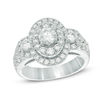 Thumbnail Image 1 of Celebration Ideal 2 CT. T.W. Certified Diamond Layered Oval Frame Three Stone Ring in 14K White Gold (I/I1)