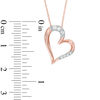 Thumbnail Image 1 of 1/10 CT. T.W. Diamond Tilted Heart Pendant in 10K Rose Gold