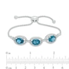 Thumbnail Image 2 of Oval London Blue Topaz and Lab-Created White Sapphire Frame Three Stone Bolo Bracelet in Sterling Silver - 9.0"