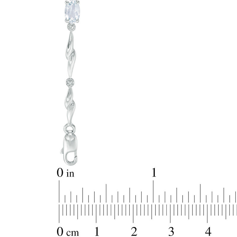 Oval Aquamarine and Diamond Accent Link Bypass Bracelet in Sterling Silver - 7.25"