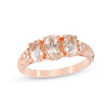 Thumbnail Image 0 of Oval Morganite and Diamond Accent Three Stone with Tri-Sides Ring in 10K Rose Gold