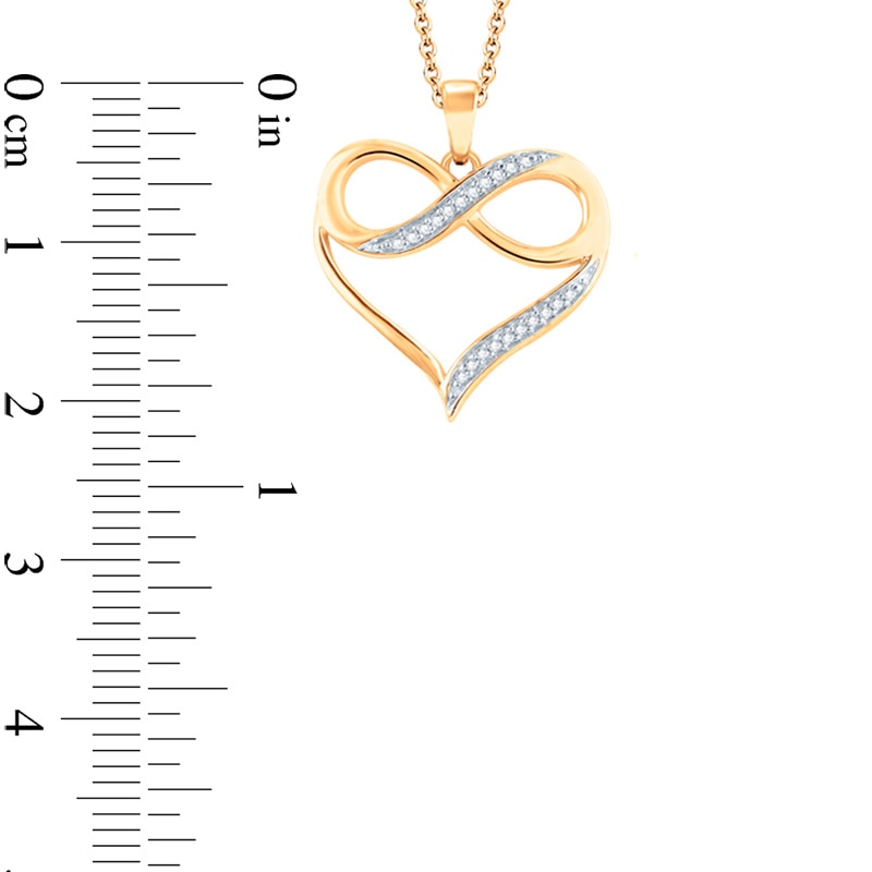 Main Image 2 of 1/20 CT. T.W. Diamond Heart with Infinity Pendant in 10K Gold