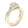 Thumbnail Image 1 of 3/8 CT. T.W. Diamond Cushion Frame Twist Bridal Set in 14K Gold