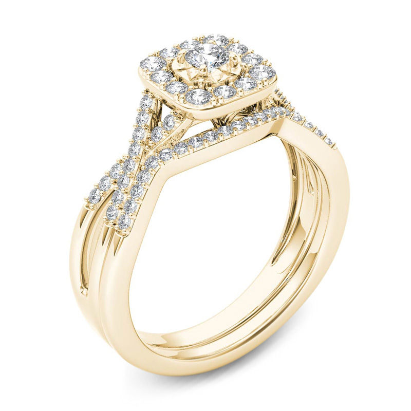 3/8 CT. T.W. Diamond Cushion Frame Twist Bridal Set in 14K Gold