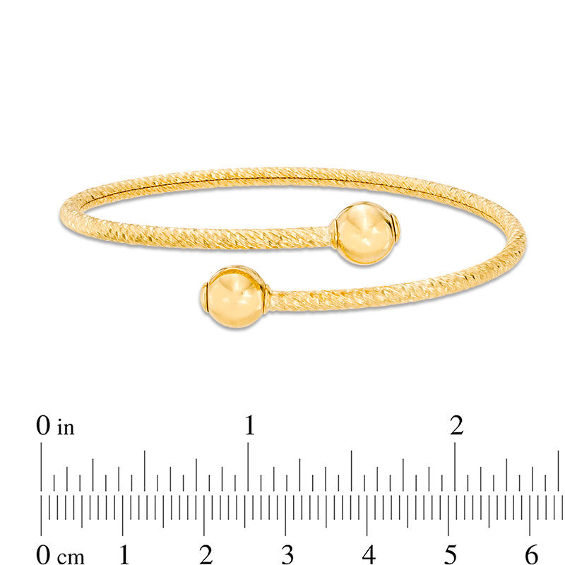 Made in Italy Diamond-Cut Bypass Flex Bangle in 14K Gold - 7.5"
