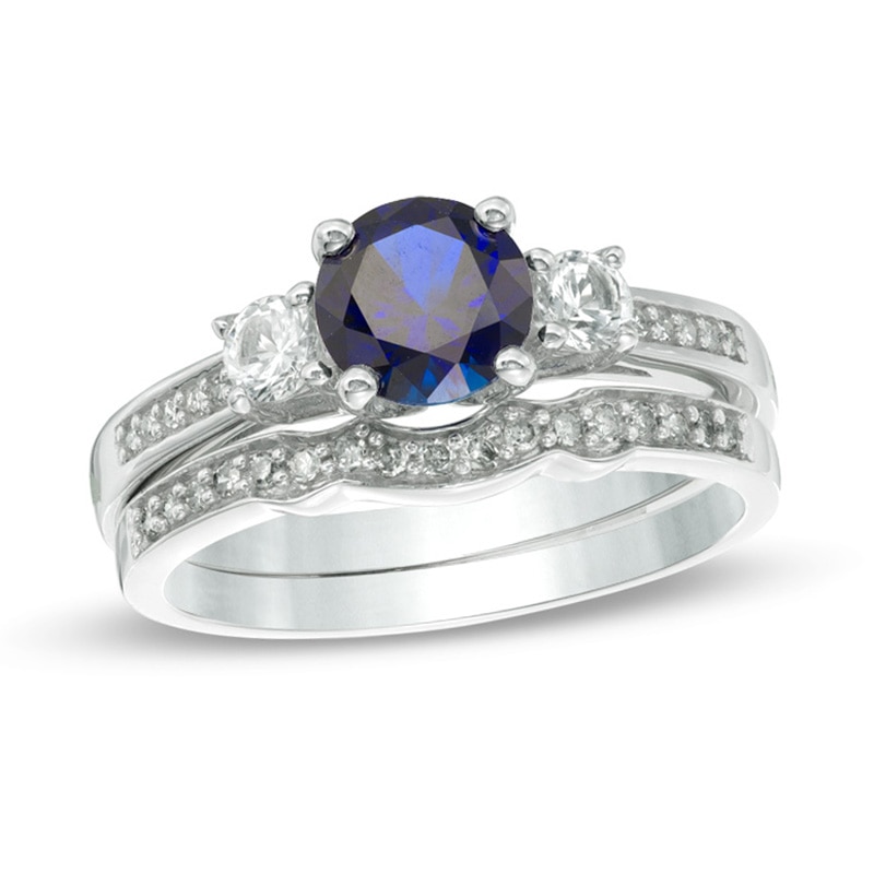 6.0mm Lab-Created Blue and White Sapphire with 1/8 CT. T.W. Diamond Three Stone Bridal Set in 10K White Gold