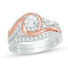 Thumbnail Image 0 of 1 CT. T.W. Diamond Layered Bypass Swirl Bridal Set in 14K Two-Tone Gold