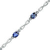 Thumbnail Image 1 of Oval Lab-Created Ceylon Sapphire Infinity Link Bracelet in Sterling Silver - 7.25"