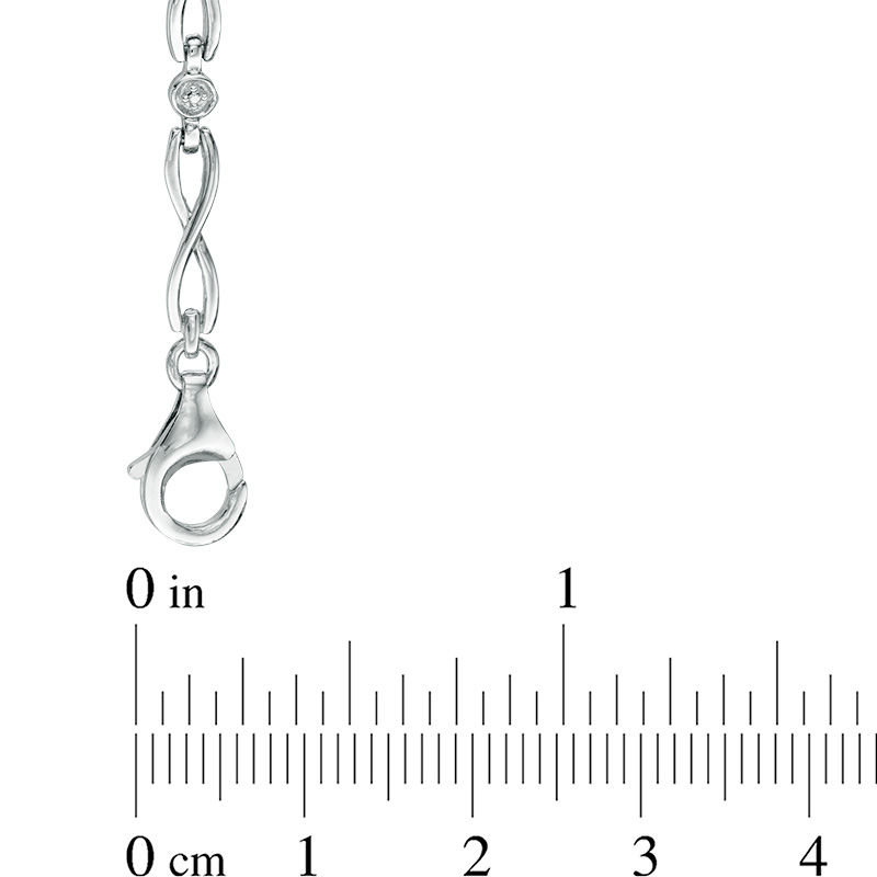 Main Image 2 of Oval Lab-Created Ceylon Sapphire Infinity Link Bracelet in Sterling Silver - 7.25"