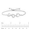 Thumbnail Image 2 of 1/20 CT. T.W. Diamond Triple Heart Bolo Bracelet in Sterling Silver - 9.5"