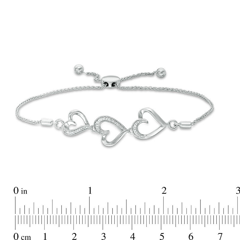 Main Image 2 of 1/20 CT. T.W. Diamond Triple Heart Bolo Bracelet in Sterling Silver - 9.5"