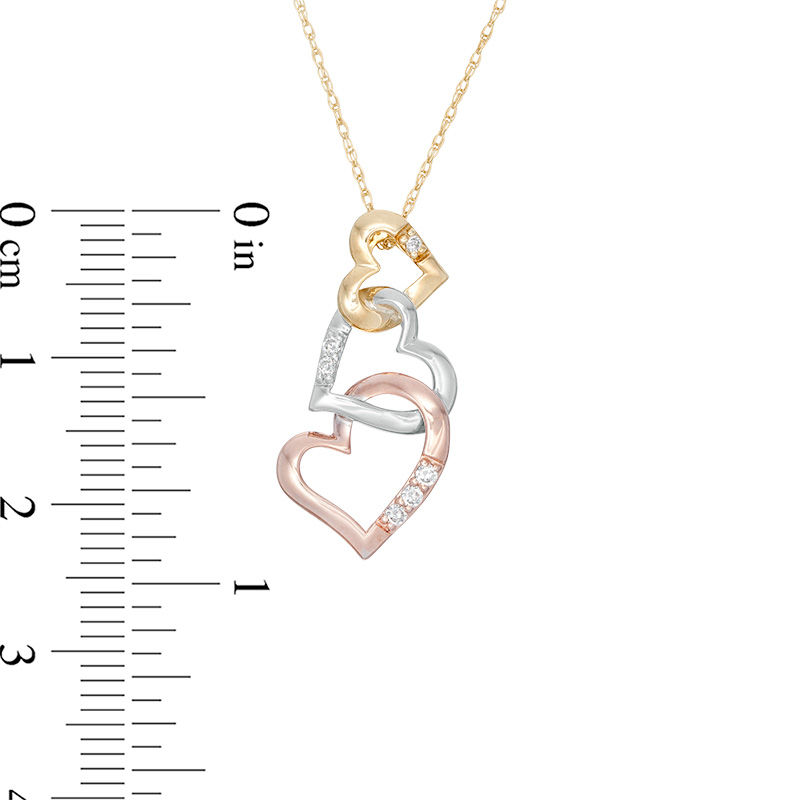 Main Image 2 of 1/15 CT. T.W. Diamond Linear Alternating Triple Heart Pendant in 10K Tri-Tone Gold