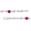 Thumbnail Image 1 of 5.0mm Heart-Shaped Lab-Created Ruby and Diamond Accent Bypass Link Bracelet in Sterling Silver - 7.25"