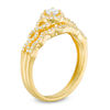 Thumbnail Image 1 of 3/8 CT. T.W. Diamond Frame Twist Bridal Set in 10K Gold