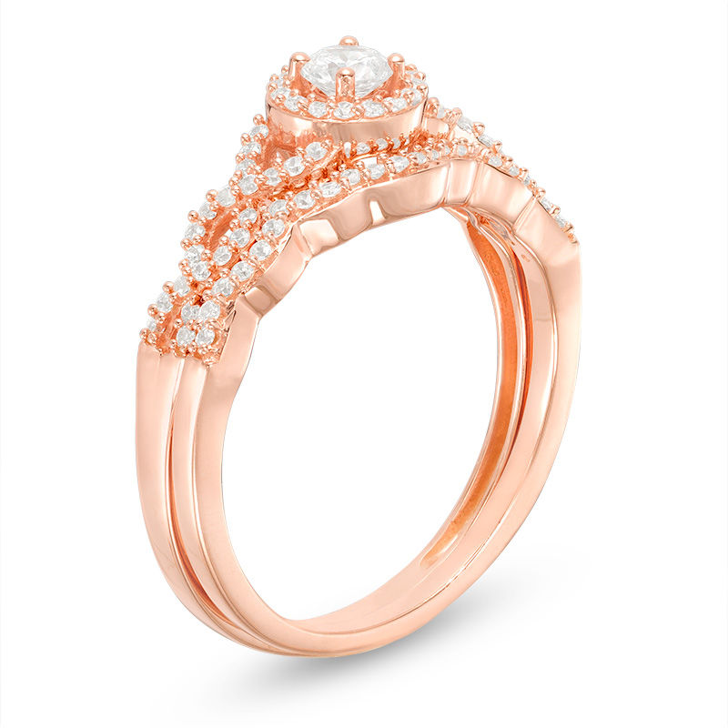 3/8 CT. T.W. Diamond Frame Twist Bridal Set in 10K Rose Gold