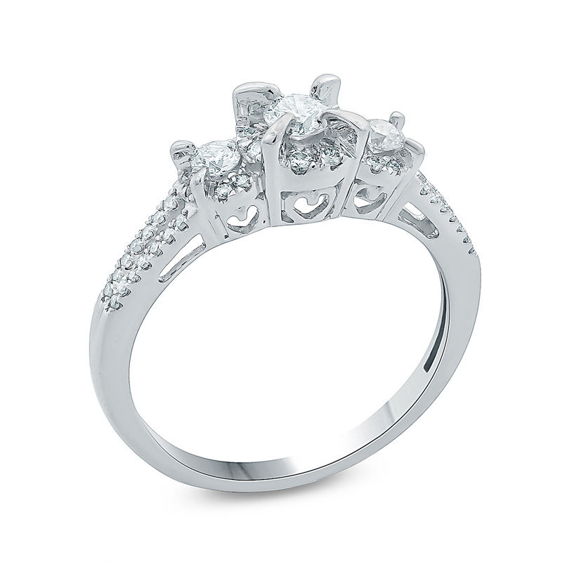 Platinum Emerald Three Stone Engagement Ring