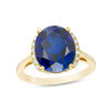 Thumbnail Image 1 of Oval Lab-Created Blue Sapphire and 1/20 CT. T.W. Diamond Collared Ring in 10K Gold