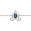 Thumbnail Image 2 of Enchanted Disney Cinderella Oval Blue Topaz and 1/10 CT. T.W. Diamond Carriage Bolo Bracelet in Sterling Silver - 9.5"