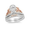 Thumbnail Image 1 of Enchanted Disney Princess 7/8 CT. T.W. Pear-Shaped Diamond Frame Tiara Bridal Set in 14K Two-Tone Gold