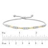 Thumbnail Image 2 of 1/4 CT. T.W. Diamond Three Stone Alternating Concave Link Bolo Bracelet in 10K Two-Tone Gold - 9.9"