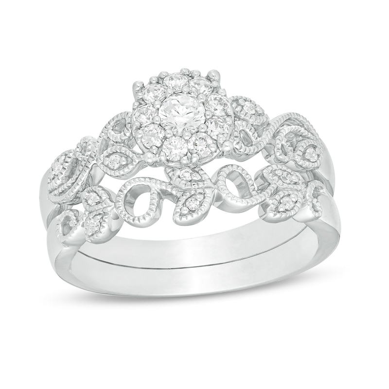 Main Image 1 of 1/3 CT. T.W. Diamond Frame Vine-Shank Vintage-Style Interlocking Bridal Set in 10K White Gold