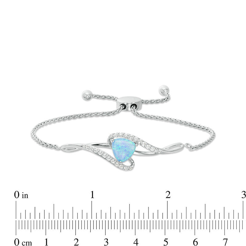 8.0mm Trillion-Cut Lab-Created Blue Opal and White Sapphire Swirl Bypass Bolo Bracelet in Sterling Silver - 9.7"