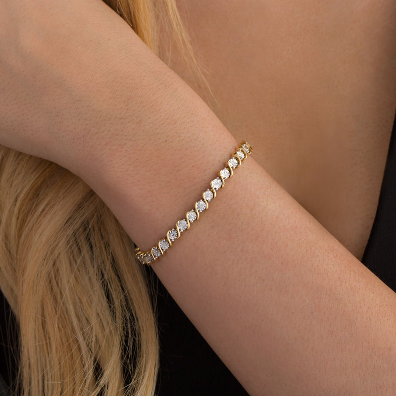 Main Image 2 of 1/10 CT. T.W. Diamond "S" Tennis Bracelet in Sterling Silver with 14K Gold Plate - 7.25"