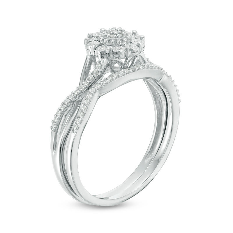 Main Image 2 of 1/6 CT. T.W. Composite Diamond Flower Twist Bridal Set in Sterling Silver