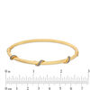 Thumbnail Image 1 of Made in Italy Glitter Enamel Ribbon Wrap Textured Tube Bangle in 14K Gold