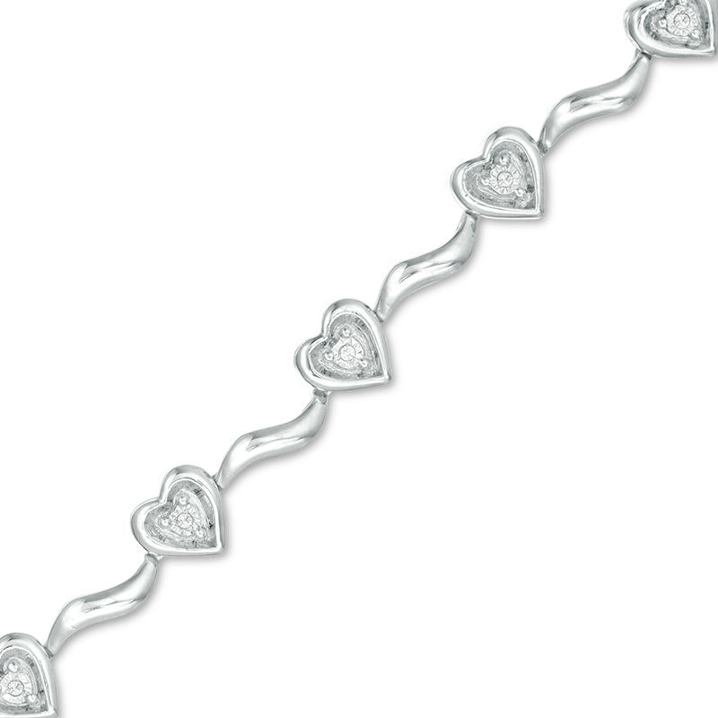 1/20 CT. T.W. Diamond Hearts Wavy Link Bracelet in Sterling Silver - 7.5"