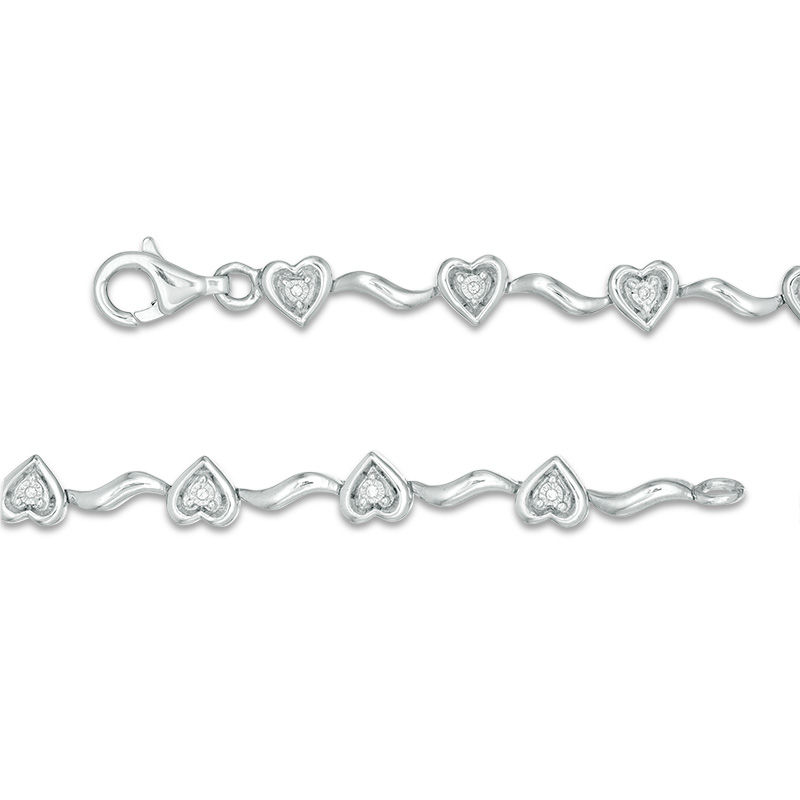 1/20 CT. T.W. Diamond Hearts Wavy Link Bracelet in Sterling Silver - 7.5"