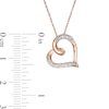 Thumbnail Image 1 of Diamond Accent Tilted Heart Pendant in 10K Rose Gold