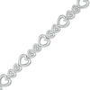 Thumbnail Image 0 of 1/10 CT. T.W. Diamond Hearts Bracelet in Sterling Silver - 7.5"
