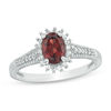 Thumbnail Image 0 of Oval Garnet and Lab-Created White Sapphire Starburst Frame Vintage-Style Ring in Sterling Silver
