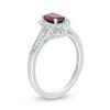 Thumbnail Image 1 of Oval Garnet and Lab-Created White Sapphire Starburst Frame Vintage-Style Ring in Sterling Silver