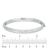 Thumbnail Image 1 of Domed Diamond-Cut Bangle in Sterling Silver - 8.0"