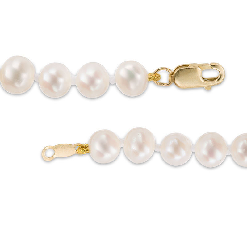 Main Image 2 of Child's 4.5-5.0mm Freshwater Cultured Pearl Strand Bracelet with 14K Gold Clasp-5.25"