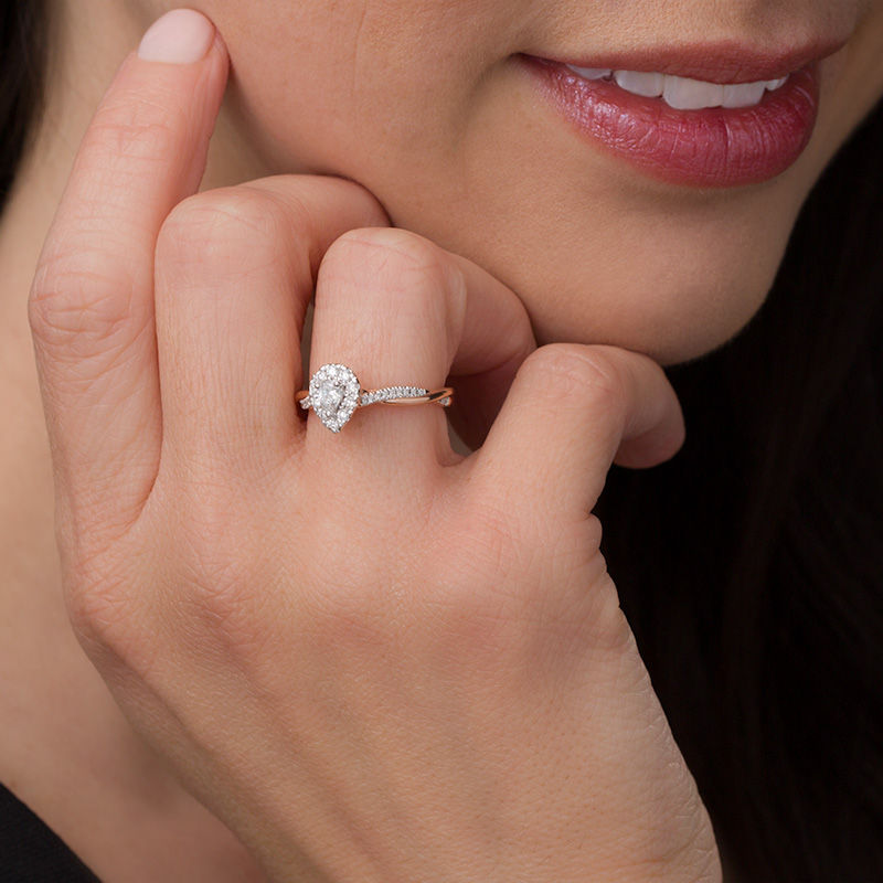 Main Image 3 of 3/8 CT. T.W. Pear-Shaped Diamond Frame Twist Engagement in 10K Rose Gold