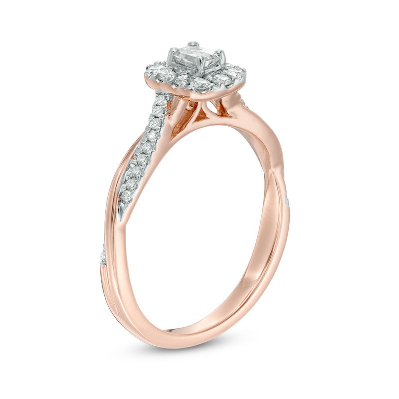 Main Image 2 of 3/8 CT. T.W. Emerald-Cut Diamond Frame Twist Engagement Ring in 10K Rose Gold