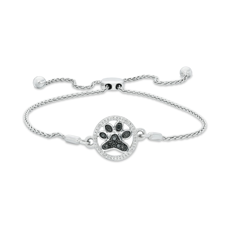 1/20 CT. T.W. Enhanced Black and White Diamond Paw Print Bolo Bracelet in Sterling Silver - 9.5"