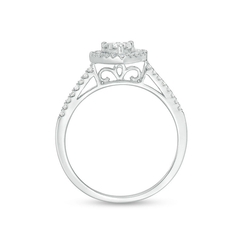 1/2 CT. T.W. Diamond Heart Frame Three Piece Bridal Set in 10K White Gold