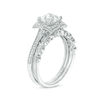Thumbnail Image 1 of Cushion-Cut Lab-Created White Sapphire and 1/4 CT. T.W. Diamond Petal Frame Vintage-Style Bridal Set in Sterling Silver