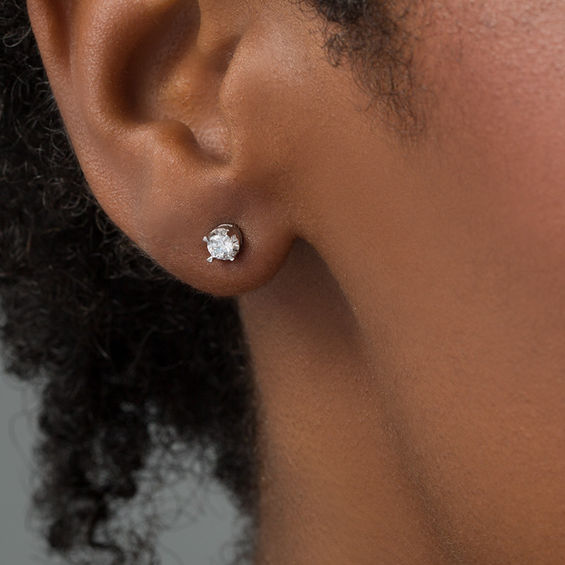 1/6 CT. T.W. Diamond Solitaire Stud Earrings in Sterling Silver 1/6 CT. T.W. Diamond Solitaire Stud Earrings in Sterling Silver